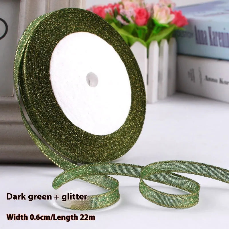 Roll of 0.6cm wide coloured polyester gift ribbon with 22 metre length.