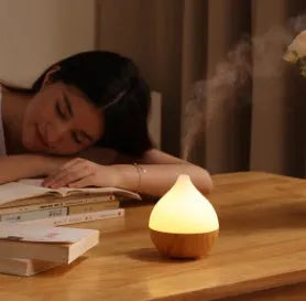 Asakusa wood grain finish vase-shaped aroma diffuser with USB cable.