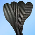 Black 3K carbon fibre running shoe insole shown from above, highlighting its woven texture.