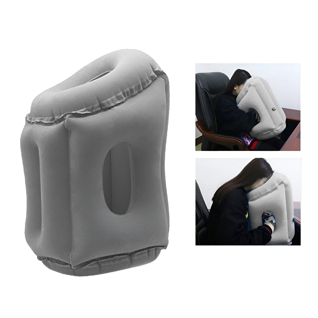 Grey inflatable sleeping pillow with flocking surface deflated on surface with storage bag