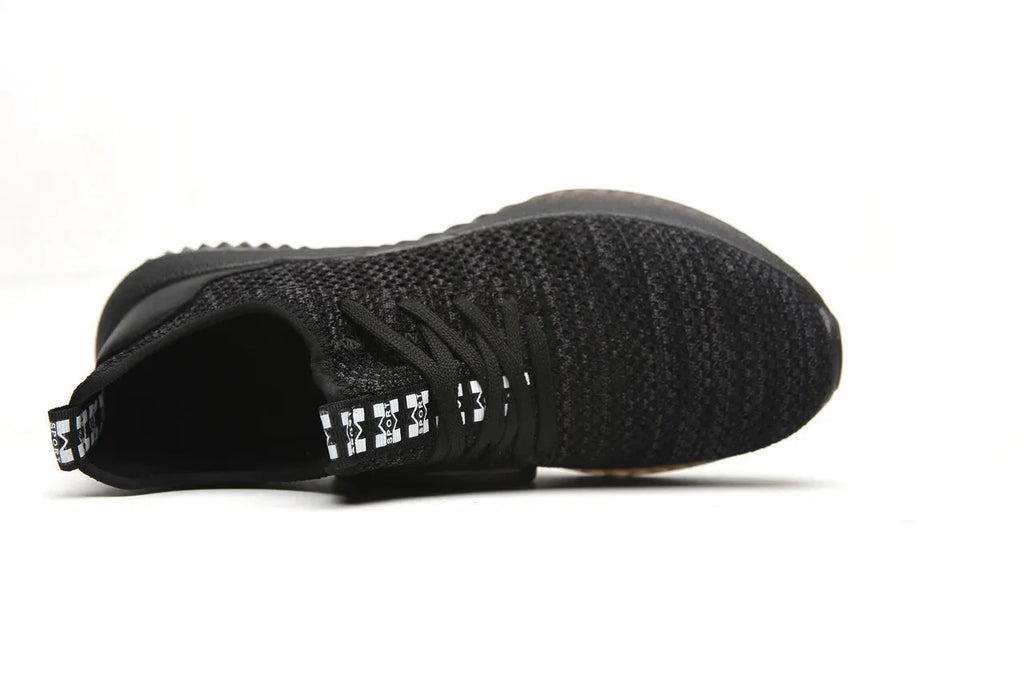 Men's black safety work shoes with steel toe caps and low-cut design for industrial use