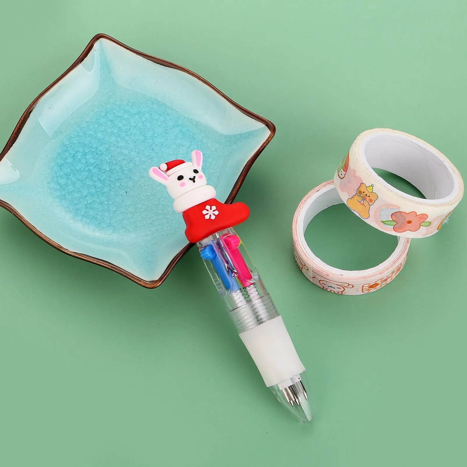 Compact 11cm Christmas four-colour ballpoint pen with press mechanism in festive designs