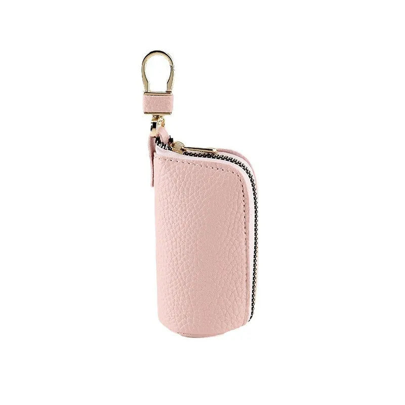 Simple men's zipper key case in black PU leather with minimalist urban design