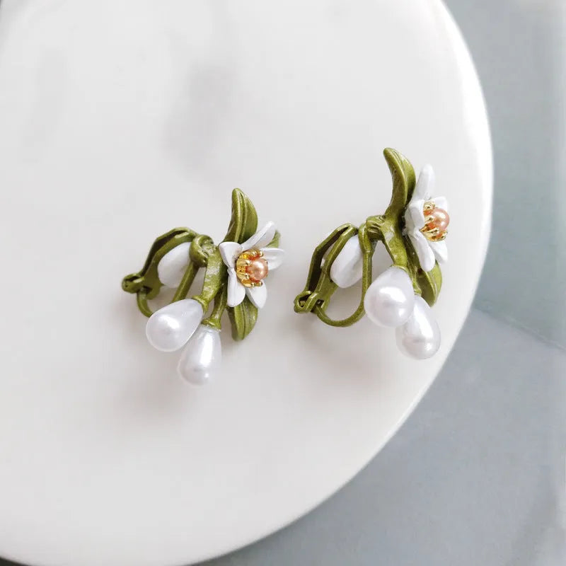 Alloy camellia flower earrings with sterling silver needle detailing for women