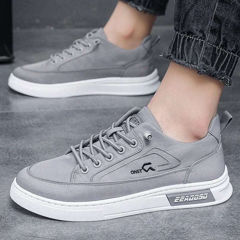 Men's grey canvas casual sneakers with leather lining and round toe design