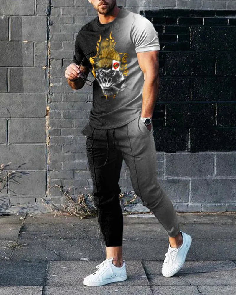 Men's short-sleeved round neck pullover and matching trousers sportswear set in polyester blend fabric
