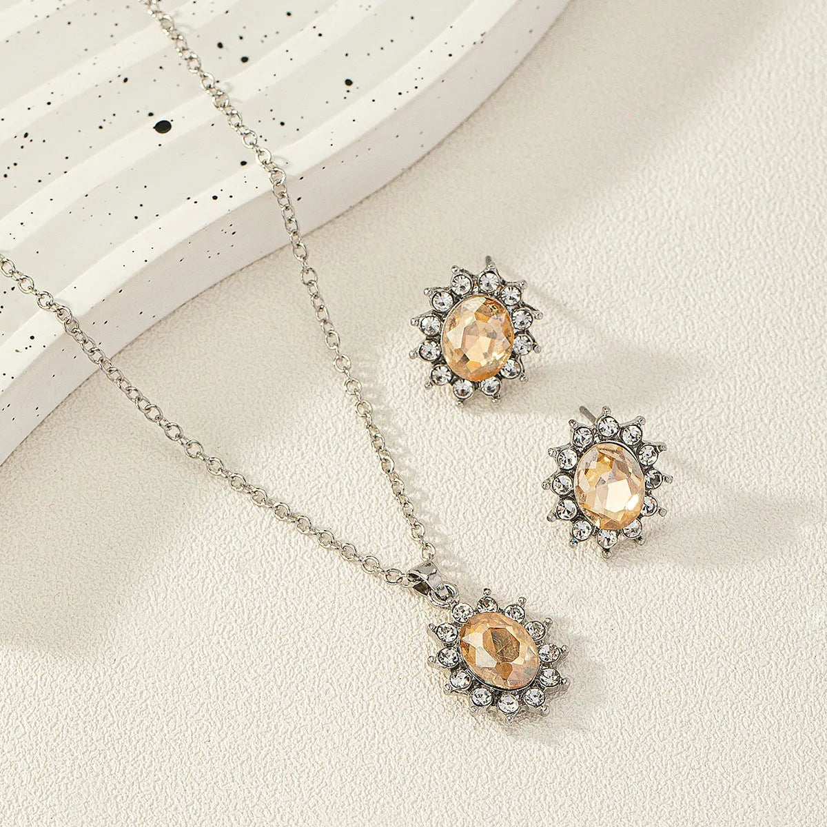 Sunflower zircon ear stud and necklace set for women in electroplated alloy with ellipse design elements