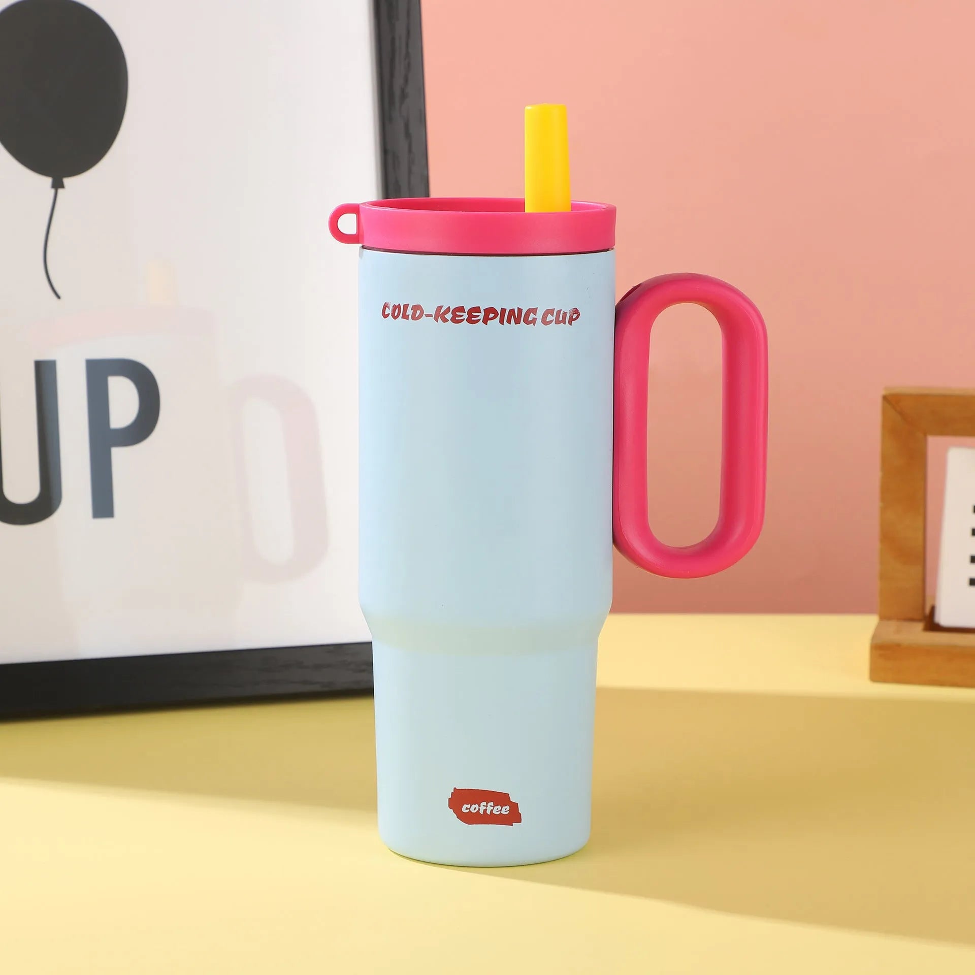DIY Vitality large insulated straw cup with handle in black, pink, blue, white, or yellow.