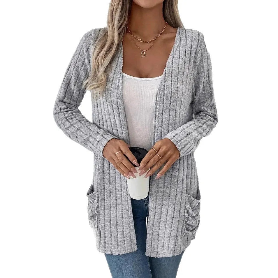 Solid colour long sleeve cardigan with pockets in loose fit design available in black and granny grey