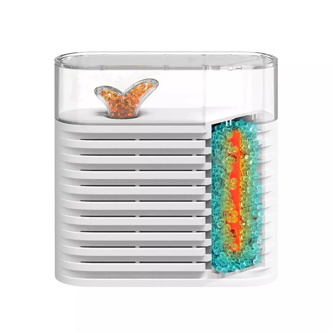 White recyclable electric dehumidifier box for cabinets with transparent top showing orange silica gel crystals.
