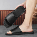 Men's brown leather outdoor sandals with rubber soles shown from side perspective