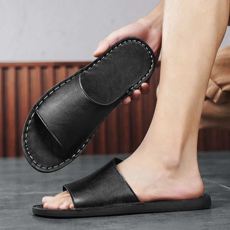 Men's brown leather outdoor sandals with rubber soles shown from side perspective