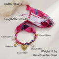 Stainless steel geometric pendant necklace and matching bracelet set with electroplated 18K gold finish