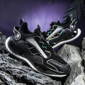 Men's low-top mesh sports shoes in black with an elastic band closure and textured popcorn TPU sole.