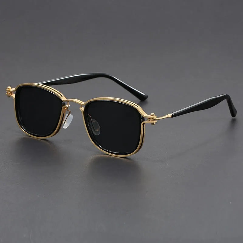 Retro style square sunglasses with a mixed metal and plastic frame and AC lenses.