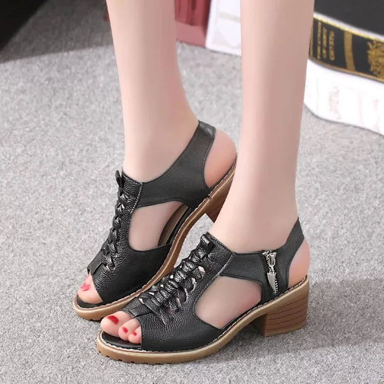 Retro style women's sandals with a side zipper and a middle heel on a beef tendon sole.