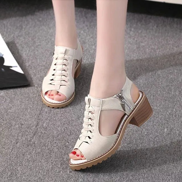Retro style women's sandals with a side zipper and a middle heel on a beef tendon sole.