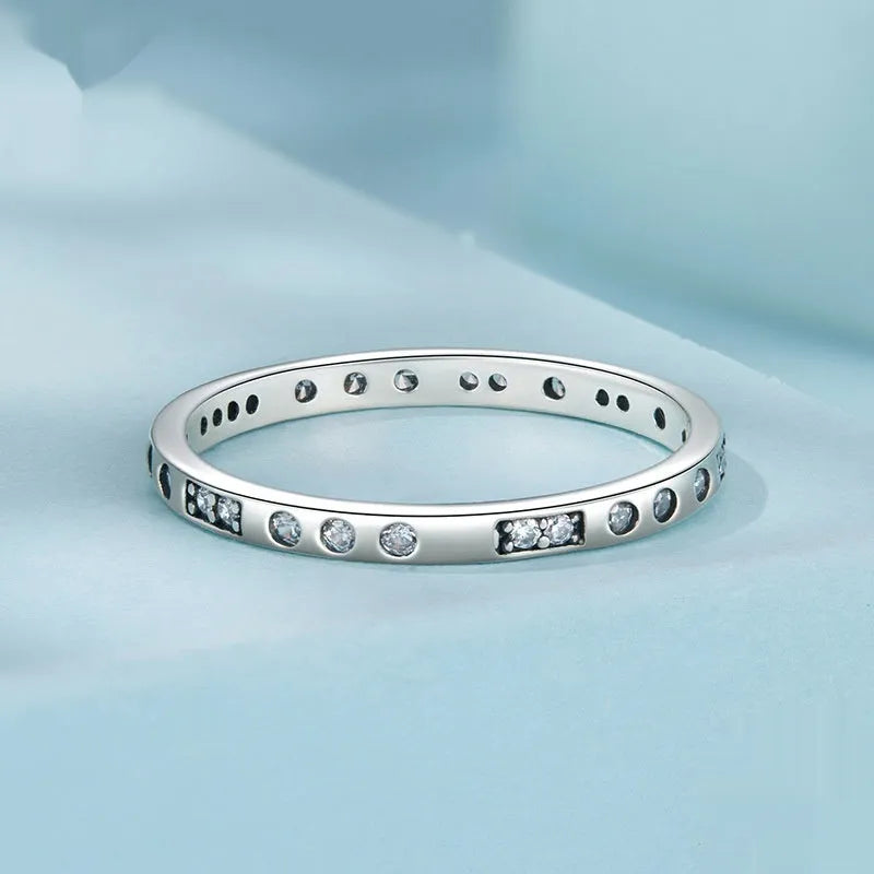 Moss Password I Love You silver ring with oxidised black finish, shown in size 7 on a model finger.