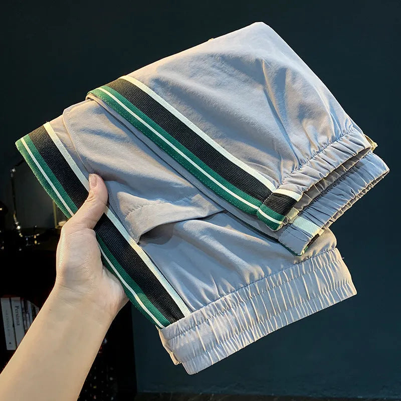 Men's solid colour cotton harem pants in mid-waist design