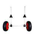 Foldable aluminium kayak cart with upright pole platform and wheels on a beach.