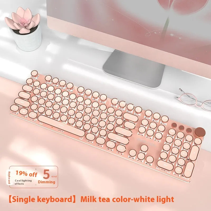Matcha green mechanical gaming keyboard with white backlighting, aluminium panel, and multifunction knob on desk