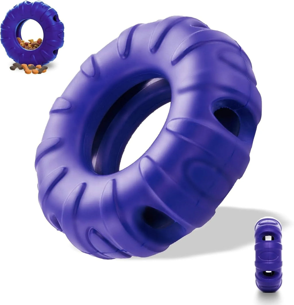 Blue, green, and red tyre-shaped dog chew toy with oval openings, a slow feeder and treat dispenser.
