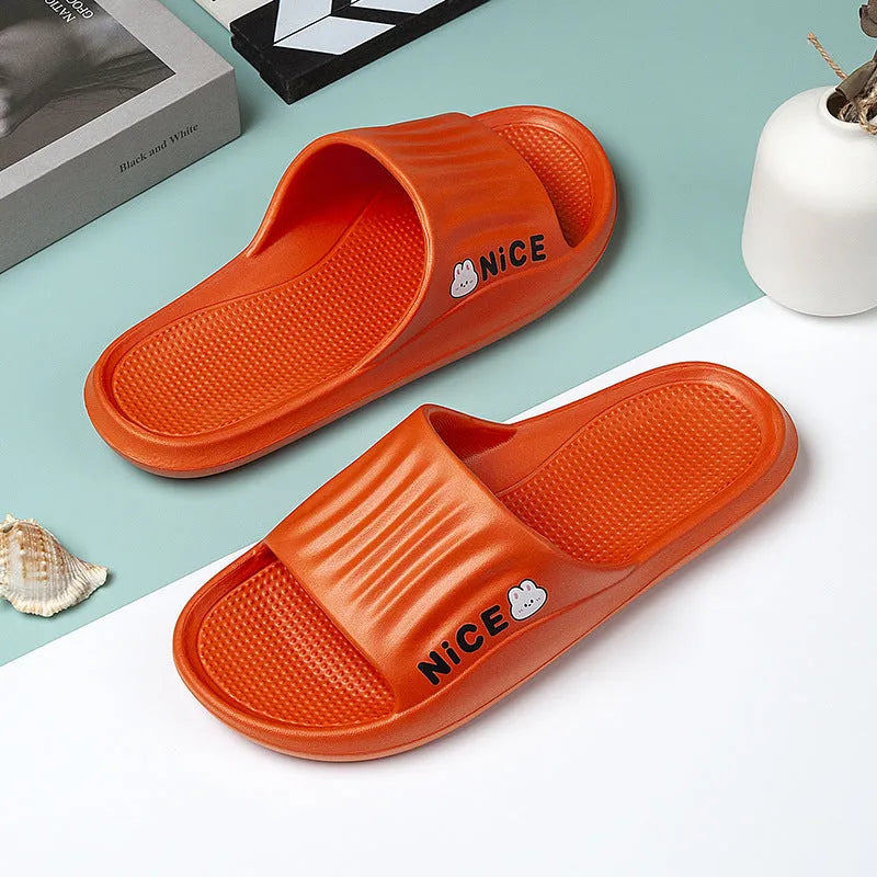 Adult unisex EVA bathroom slippers with cartoon pattern and non-slip sole in multiple colour options