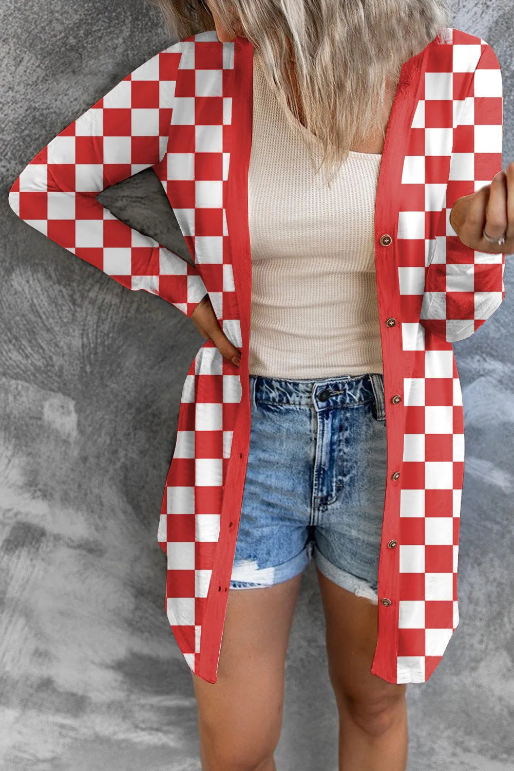 Women's long grey plaid knitted coat cardigan with contrasting colour blocks, loose fit, and regular sleeves.