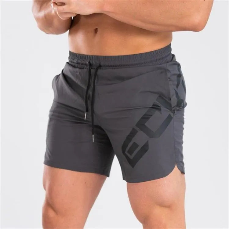 Men's black knee-length running shorts with elastic waist, shown flat for detail.