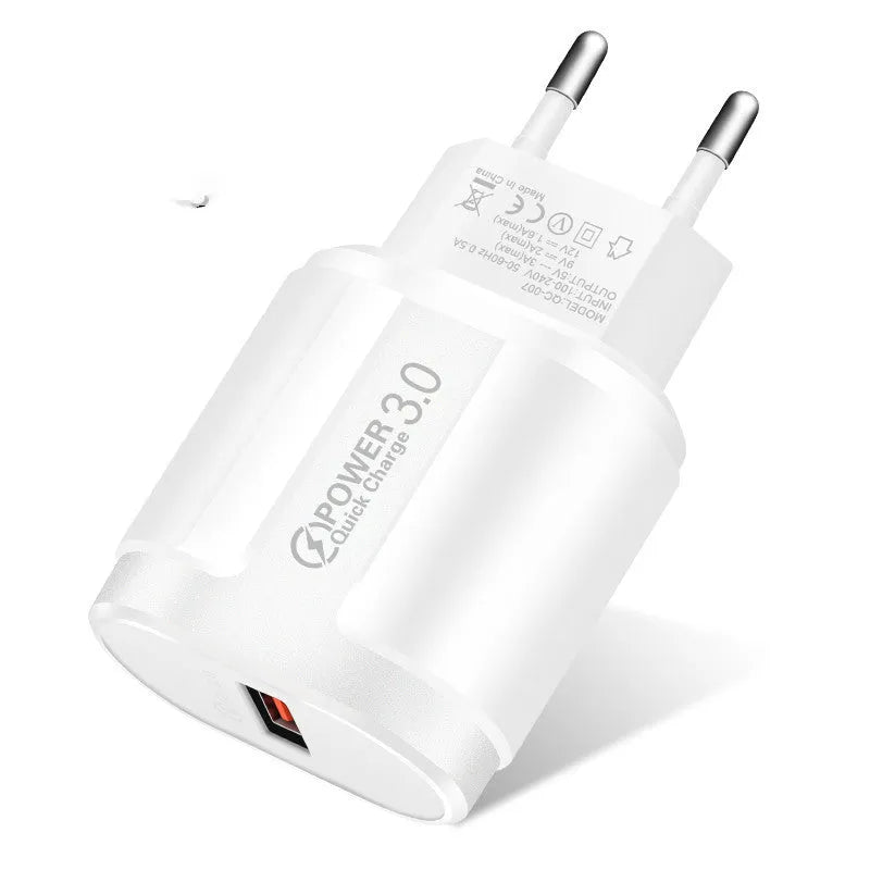 White and black international smartphone charger with UK, US and EU plug options