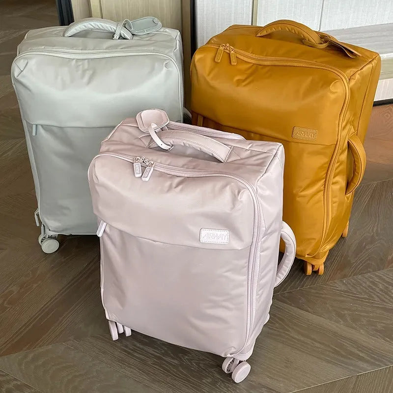 Ultra-light waterproof Oxford cloth suitcase with universal wheels in contemporary colour options