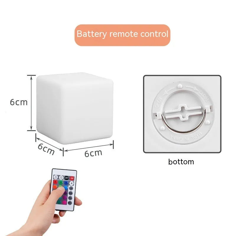 Small square night light showing seven colour changing modes, with remote control.
