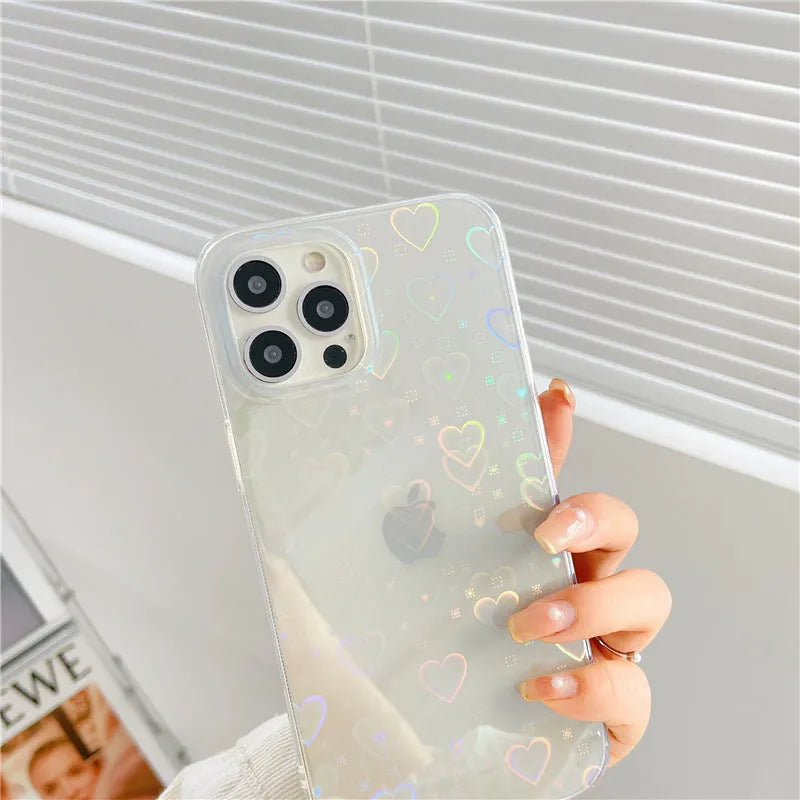 Transparent silicone iPhone case with laser-etched Love design on the back.