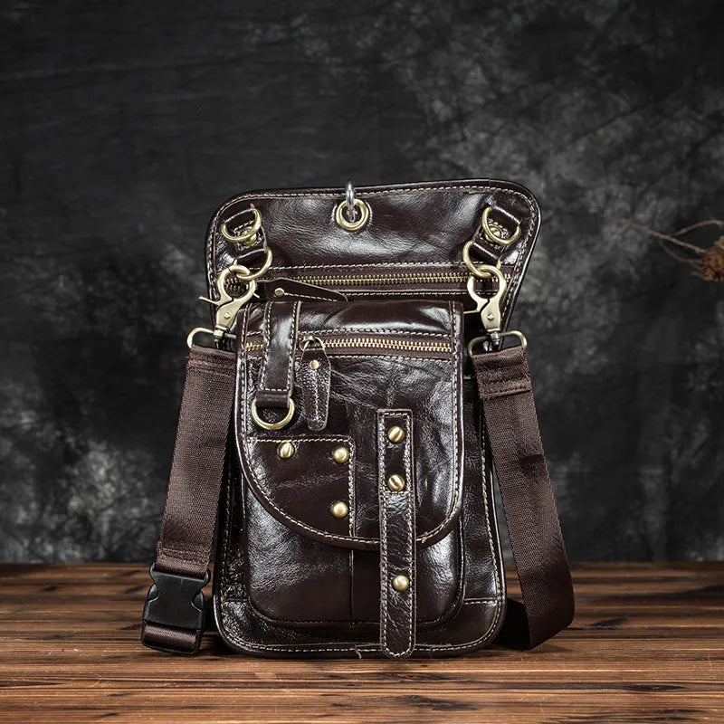 Genuine cowhide leather punk fanny pack with zipper closure showing internal phone and ID pockets