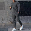 Men's solid colour two-piece polyester tracksuit with long sleeves, shown in apricot colour.