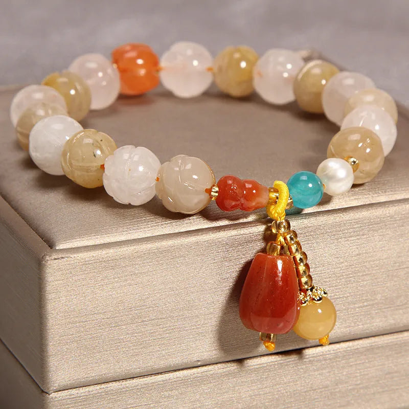 Women's multi-layer crystal bracelet with natural garnet, strawberry quartz, and moonstone pendants in Korean style.