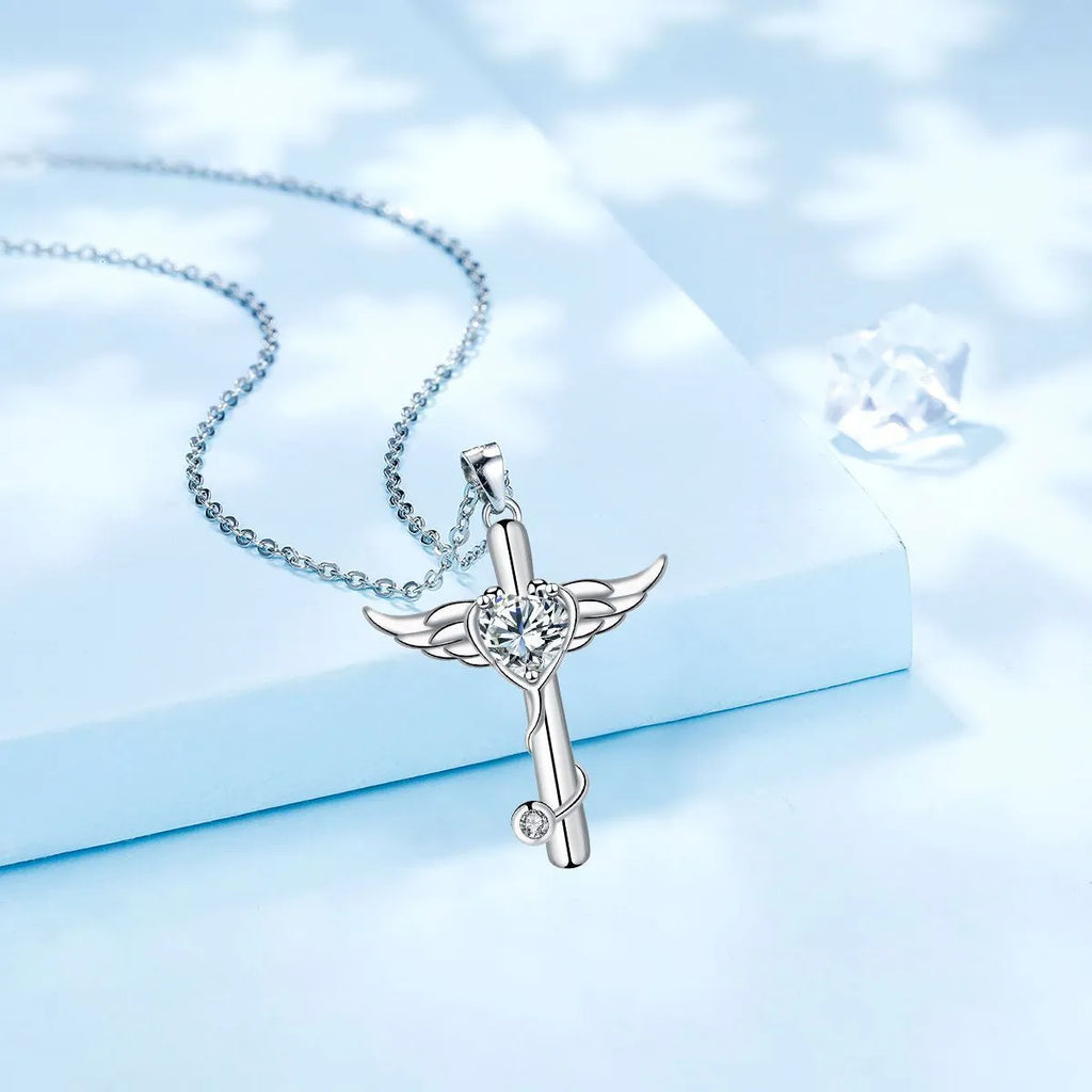 Women's cross stethoscope necklace with angel wings charm in electroplated finish