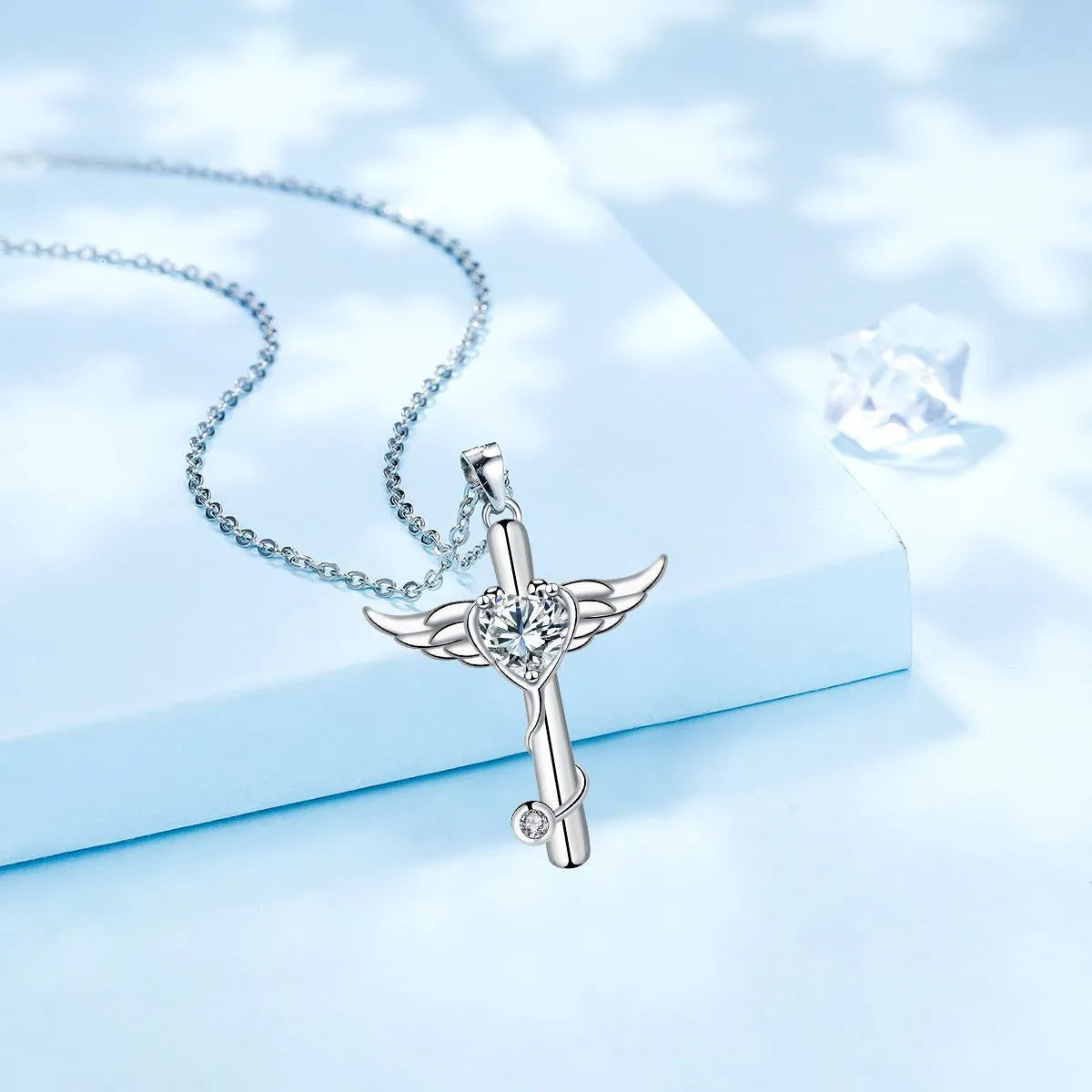 Women's cross stethoscope necklace with angel wings charm in electroplated finish