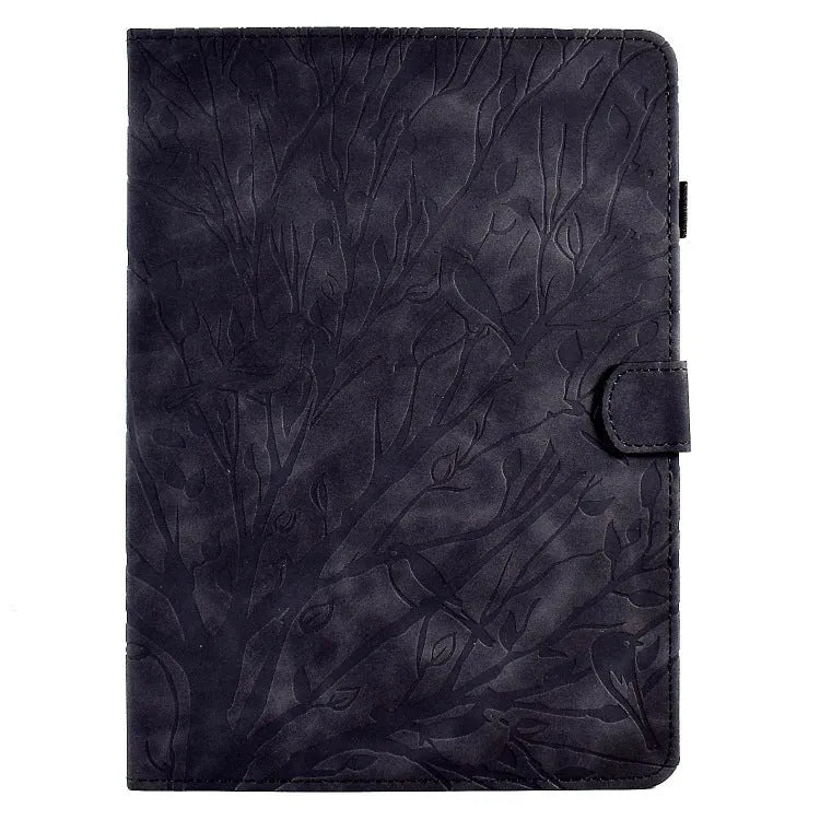 Black imitation leather tablet case with Pachira macrocarpa engraving and built-in viewing bracket open.