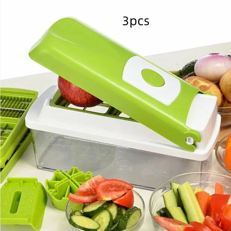 Green 12-piece manual vegetable chopper set with stainless steel blades on a kitchen counter.