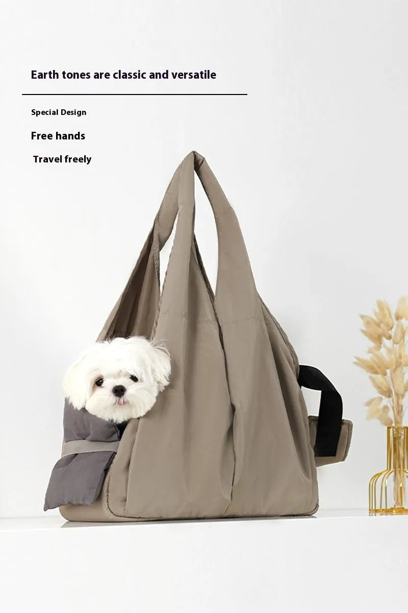 Apricot pet carrier bag with adjustable shoulder strap and side ventilation panels