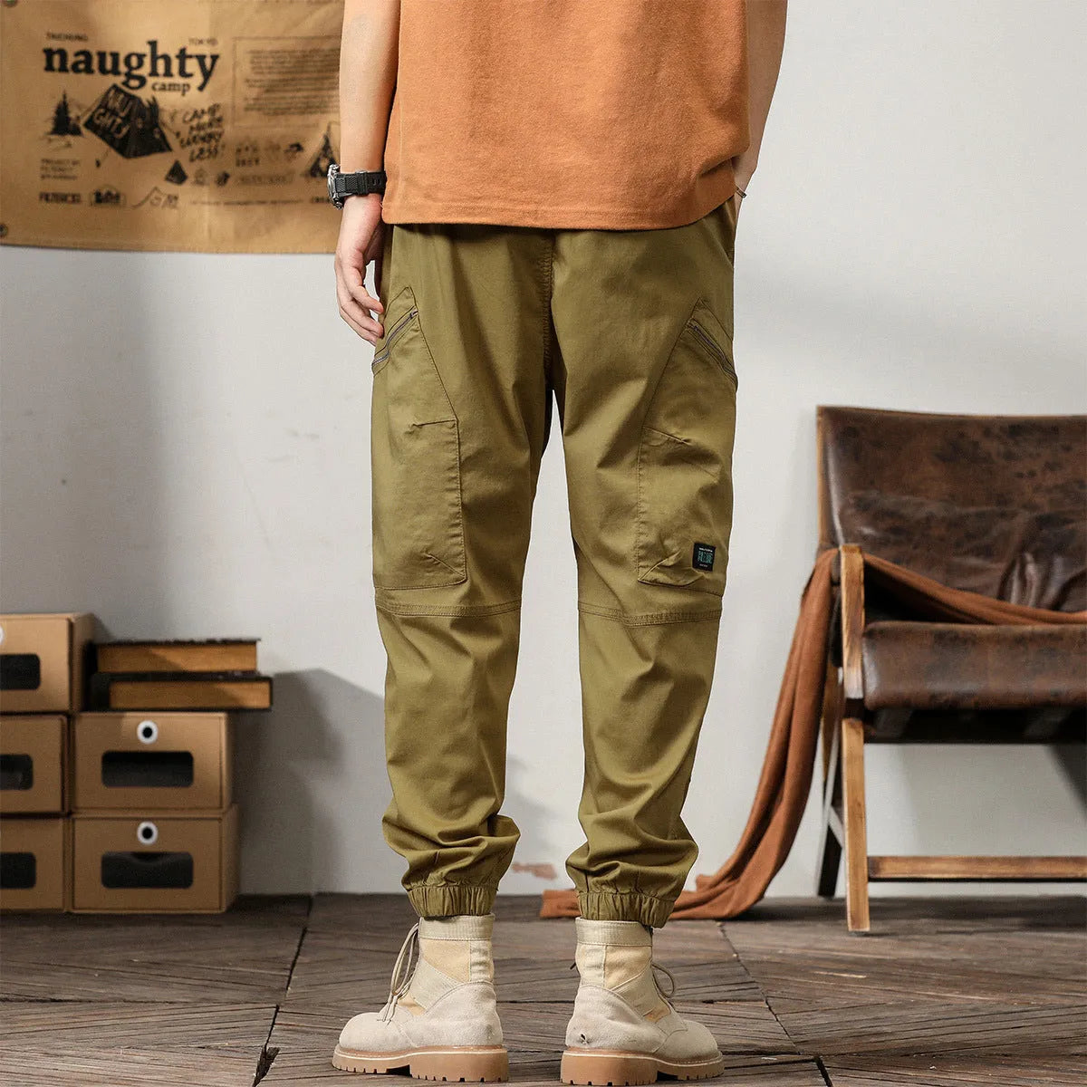 Men's cotton retro harem pants in tapered fit with ankle banding and zip fly