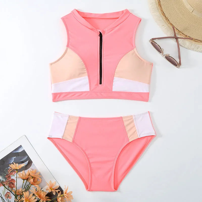 Pink high-waist bikini set with matching bra and shorts on neutral background