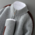 Sheep wool half-zip knitted sweater in slim fit design showing round neck and regular sleeves