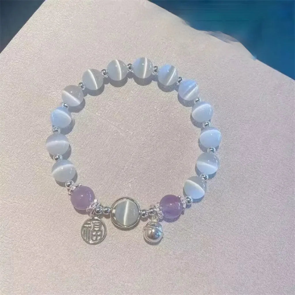 Handcrafted glass butterfly bracelet with drop-shaped moonlight grey beads and special-interest design