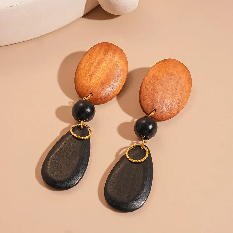 Handmade wooden retro earrings with ellipse design in silver needle-brown-black colours