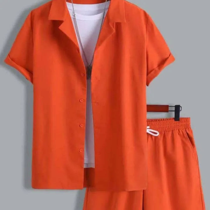 Men's white short sleeve Cuban collar sport shirt and matching shorts laid flat.