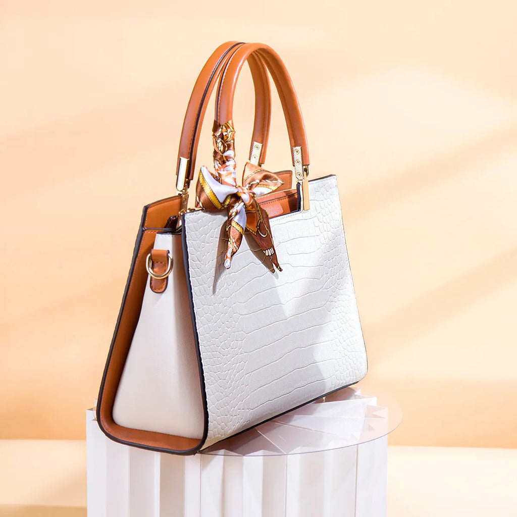 Milky white women's shoulder handbag with internal organisers and urban style sewing detailing