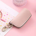 Simple men's zipper key case in black PU leather with minimalist urban design