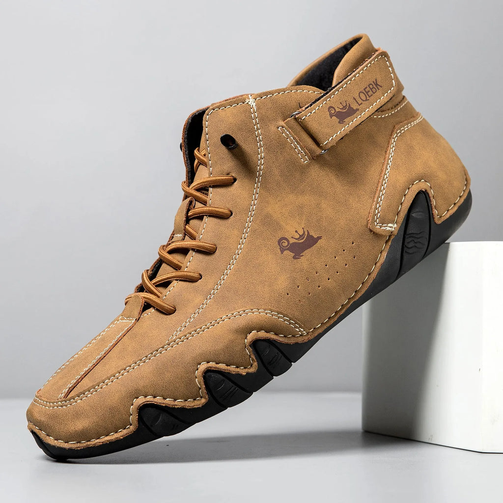 Men's brown high-top Octopus design Martin boots with a round toe and flat rubber sole.